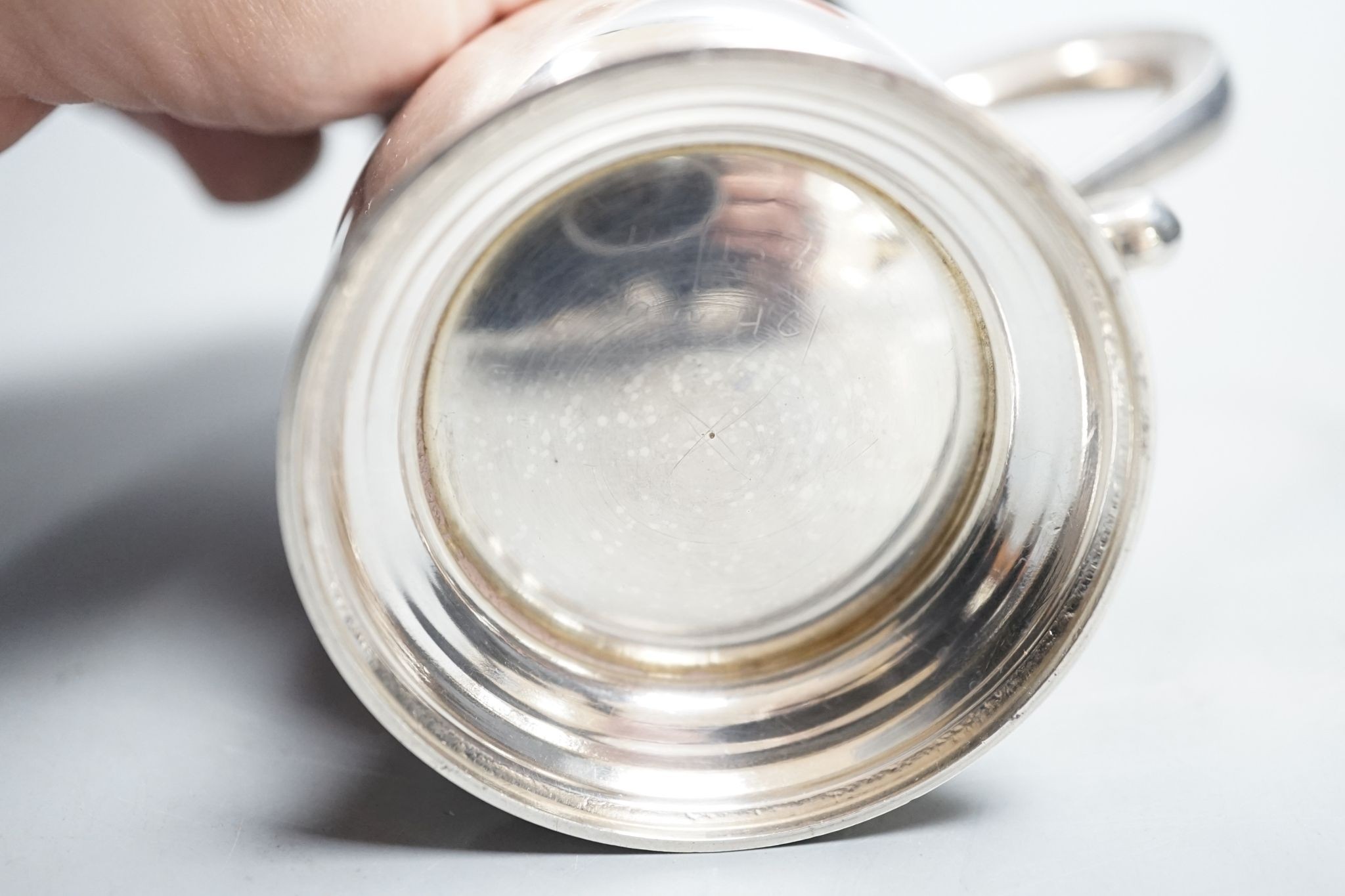 A Victorian silver christening mug, London, 1936, with engraved inscription, 89mm, 141 grams.